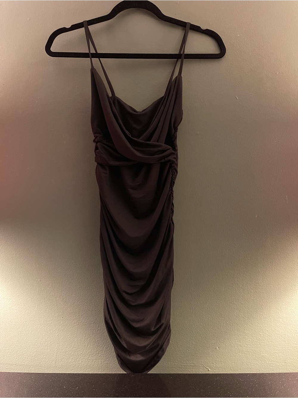 Sleek Black Cowl Mini Dress with Draped Silhouette
